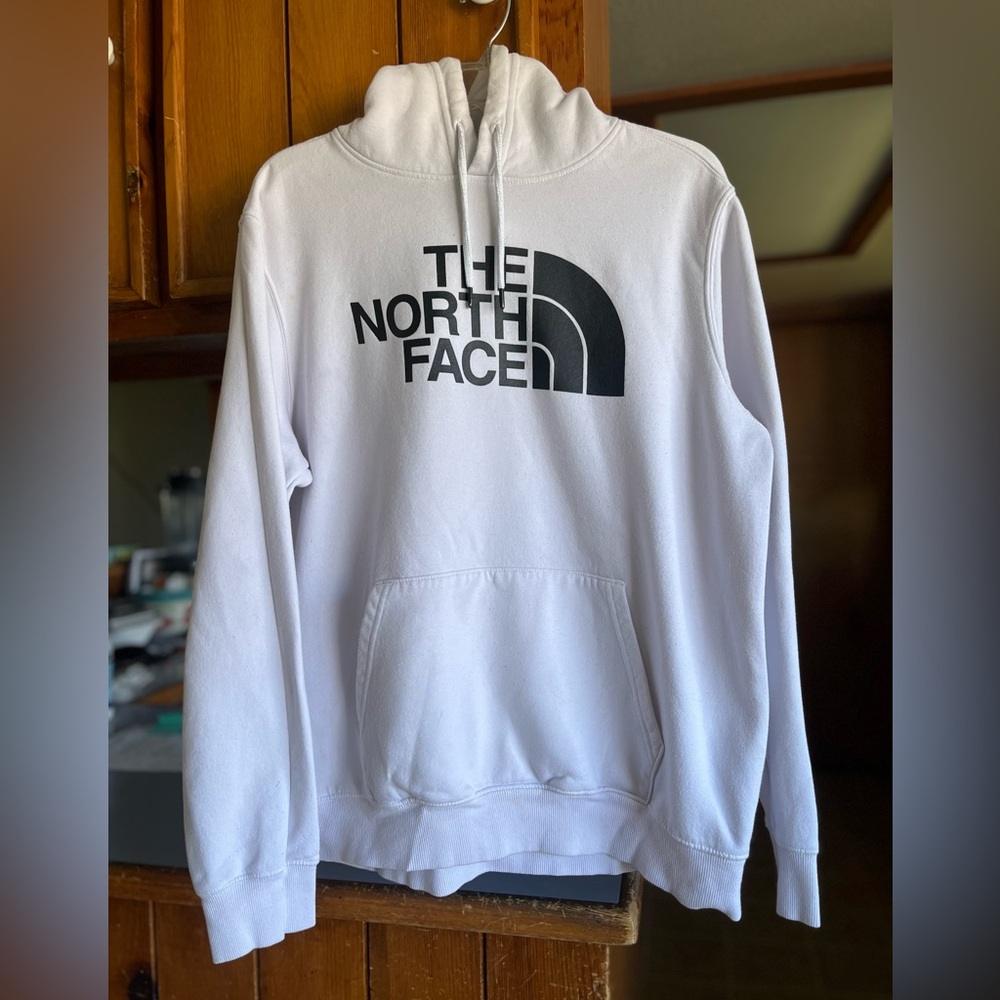 The North Face men’s white and black size L hoodie. Authentic seal. GUC.